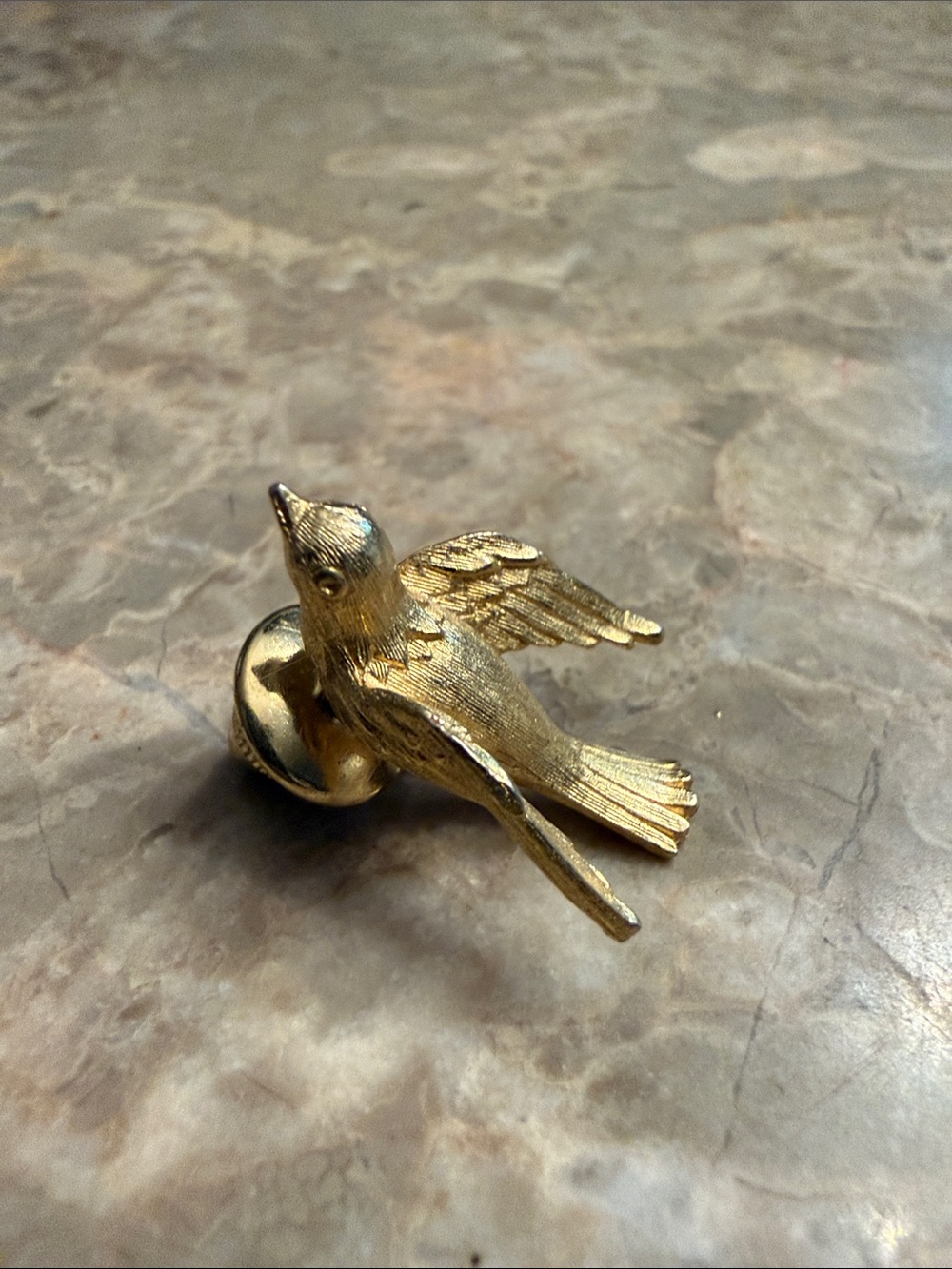 Vintage Avon gold tone, flying 3D bird landing pin